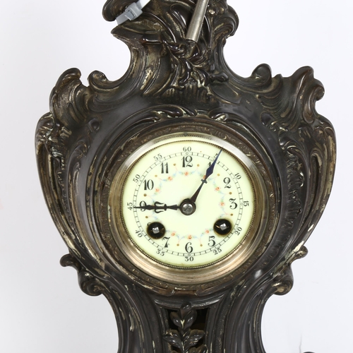 292 - A Victorian patinated spelter mantel clock in Rococo style, with 8-day striking movement and key, he... 