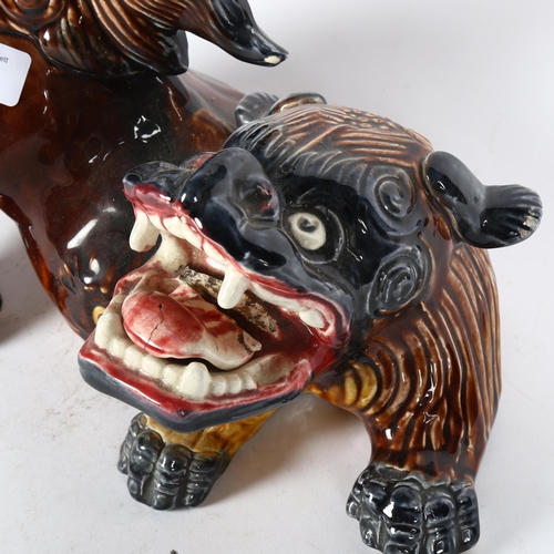 351 - A Chinese ceramic glazed dog of fo (tongue broken), length 35cm