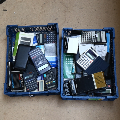 369 - A large collection of various Vintage calculators (2 boxfuls)