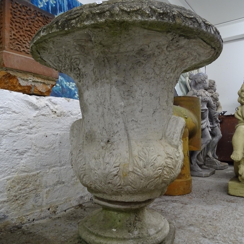 2685 - A weathered concrete garden urn, D58cm, H68cm