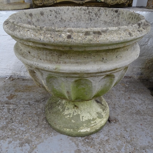 2690 - A weathered concrete circular garden urn on stand, D56cm, H55cm