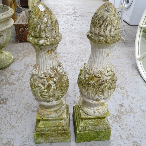 2694 - A pair of 2-section weathered concrete garden Obelisks, on square pedestal base, H74cm