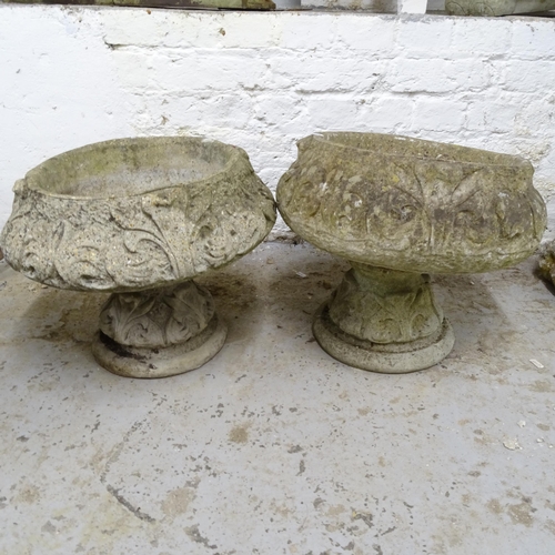 2704 - A pair of weathered concrete circular garden urns on stands, D40cm, H35cm