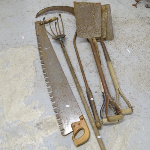 2706 - A selection of Vintage garden tools, comprising 3 shovels, a large saw, a scythe and hoe