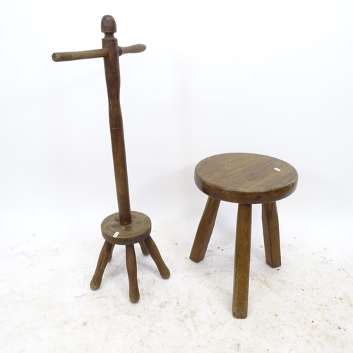 2716 - An elm milking stool, D35cm, H47cm, and a washing dolly, H92cm (2)