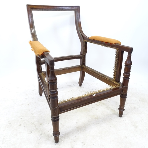 2719 - A 1920s mahogany bergere armchair (panels have been removed)