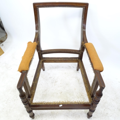 2719 - A 1920s mahogany bergere armchair (panels have been removed)