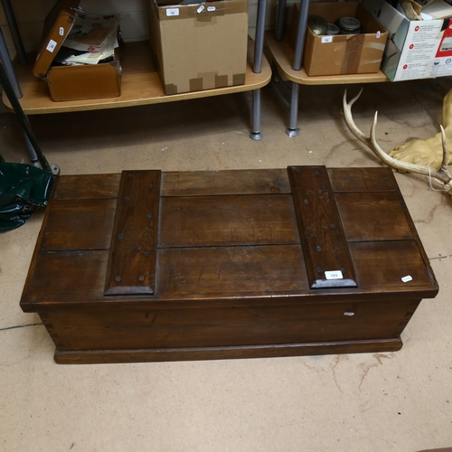 109 - A stained pine tool chest, containing various Vintage tools and chisels, width 96cm