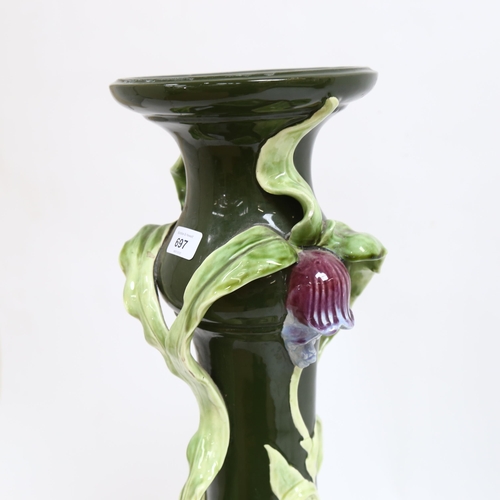 697 - A Continental Art Nouveau pottery jardiniere stand, with applied floral decoration, height 69cm