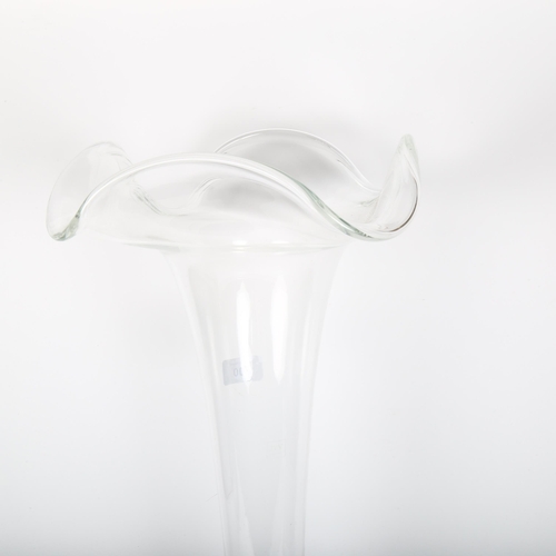 700 - A large clear glass vase with shaped rim, height 69cm