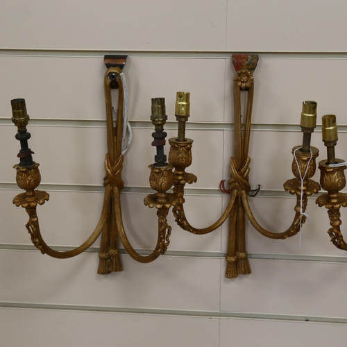 706 - A set of 4 gilt-metal twin-branch wall lights, length 33cm