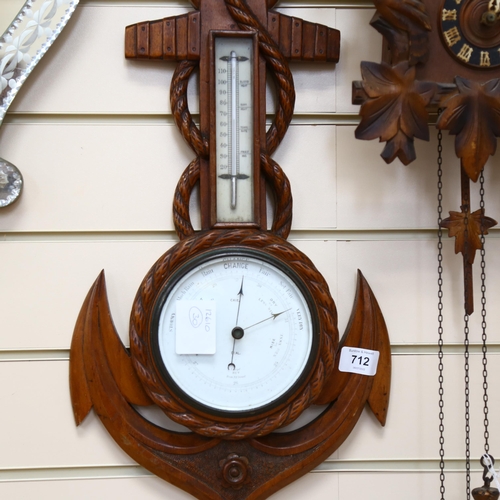 712 - A Victorian oak-framed ship's anchor design barometer, length 53cm