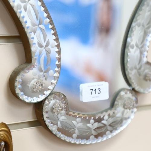 713 - A Venetian style heart-shape wall mirror, length 43cm