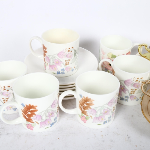 720 - A set of 3 Paragon cups and saucers, with floral decoration, and a set of 6 Wedgwood Meadow Sweet cu... 