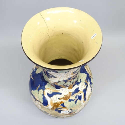 2537 - A large Chinese  blue glazed terracotta garden urn, with bird and tree decoration, H80cm