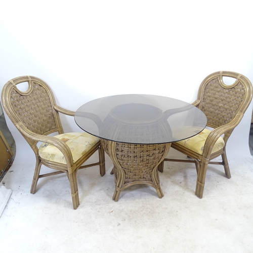 2743 - A wicker 3-piece conservatory suite, comprising table with smoked glass top and pair of armchairs