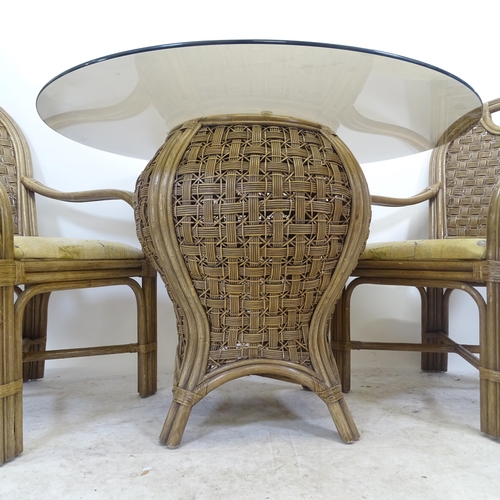 2743 - A wicker 3-piece conservatory suite, comprising table with smoked glass top and pair of armchairs