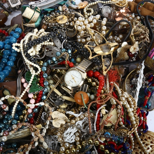 823 - A large quantity of mixed costume necklaces, brooches and other jewellery (boxful)