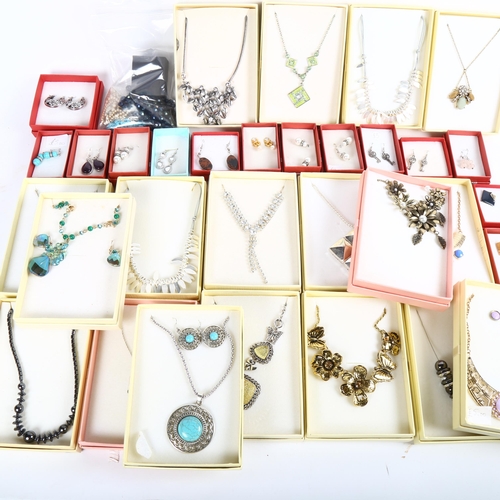 829 - A large collection of modern boxed costume necklaces, earrings etc