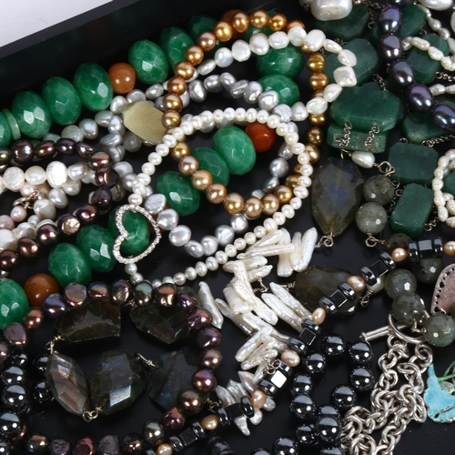 878 - A tray of silver-mounted and other jewellery, pearl bracelets, a green stone necklace etc