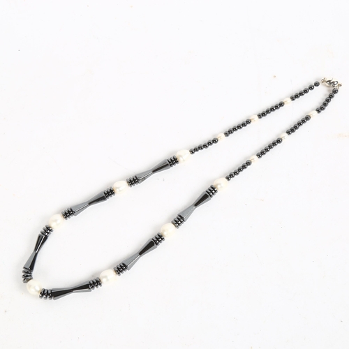 880 - FITZALAN GEMS - a hematite and freshwater pearl necklace, with silver plated magnetic clasp, length ... 