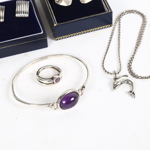 881 - A group of silver jewellery, to include earrings, amethyst set bangle and ring, dolphin necklace etc