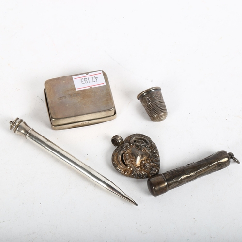 902 - A small rectangular silver pill/snuffbox, a silver propelling pencil, cigarette holder etc