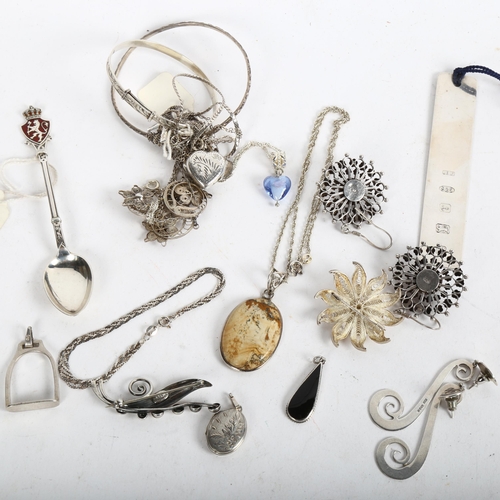 904 - A group of silver jewellery etc, to include chains, pair of target earrings, a filigree brooch, book... 