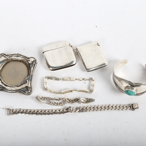 932 - 2 Victorian silver Vesta cases, a miniature silver-fronted photo frame, a silver and stone set torqu... 