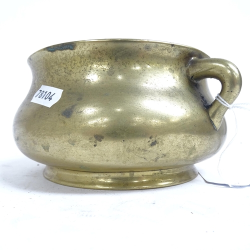 341 - A Chinese bronze censer with scrolled handles, and 6 character mark to the base, height 8.5cm