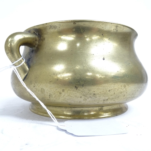 341 - A Chinese bronze censer with scrolled handles, and 6 character mark to the base, height 8.5cm