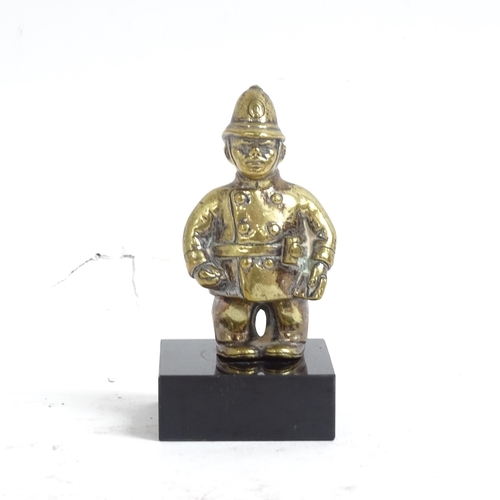 133 - A Vintage cast-brass Policeman car mascot, registration number 559804, height 10cm