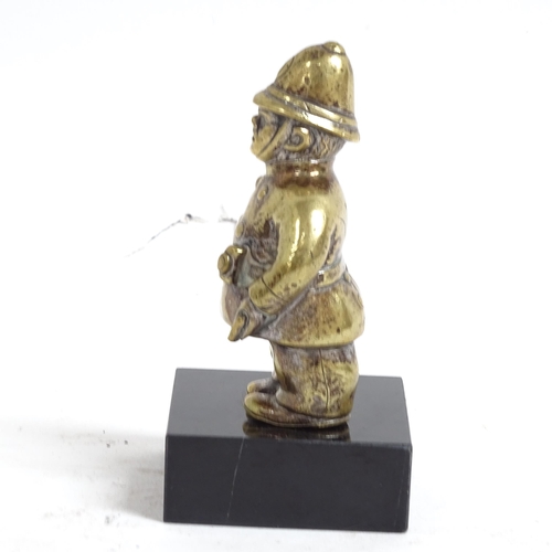 133 - A Vintage cast-brass Policeman car mascot, registration number 559804, height 10cm