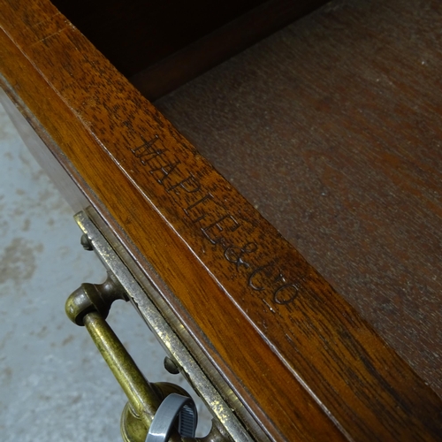 2557 - A Victorian walnut kneehole writing desk, with tooled and embossed leather skiver, drawer stamped Ma... 