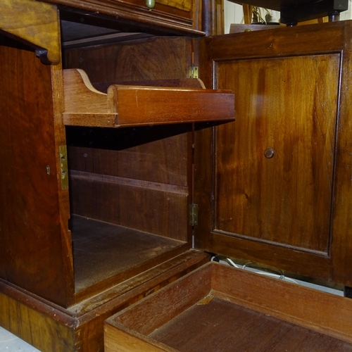 2557 - A Victorian walnut kneehole writing desk, with tooled and embossed leather skiver, drawer stamped Ma... 