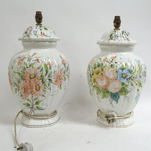 278 - A pair of large Italian ceramic table lamps, with floral decoration, height not including bayonet fi... 