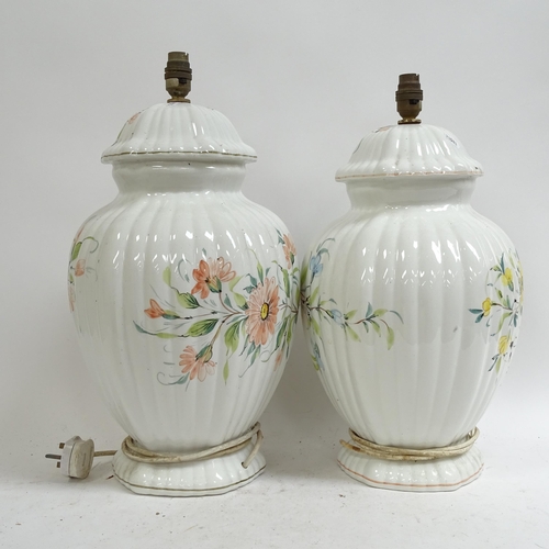 278 - A pair of large Italian ceramic table lamps, with floral decoration, height not including bayonet fi... 