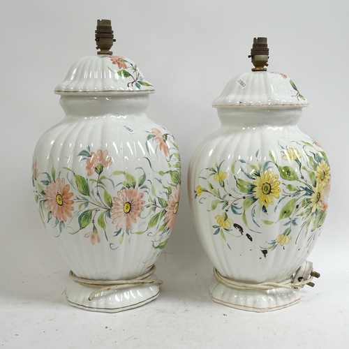 278 - A pair of large Italian ceramic table lamps, with floral decoration, height not including bayonet fi... 