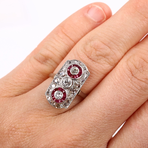 112 - An Art Deco ruby and diamond cluster panel ring, unmarked gold settings with old European and rose-c... 