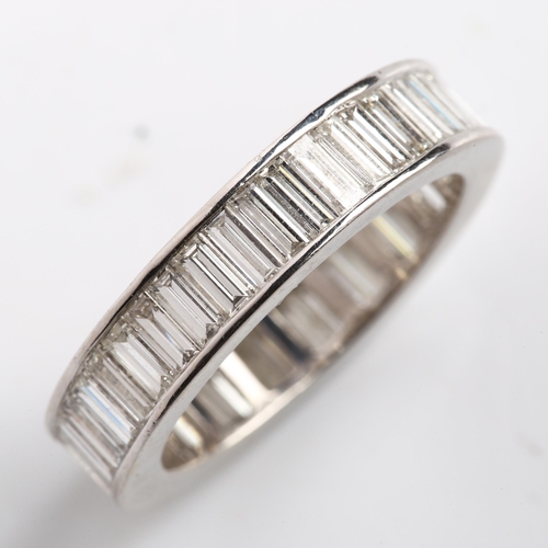 117 - A platinum diamond full eternity ring, set throughout with baguette-cut diamonds, total diamond cont... 