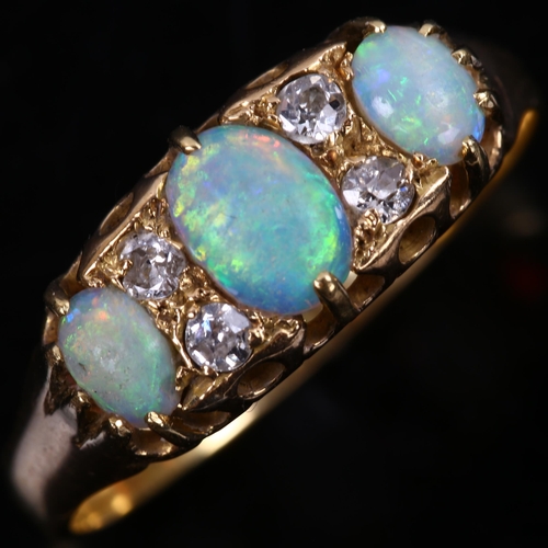 122 - An 18ct gold seven stone opal and diamond half hoop ring, set with oval cabochon opal and old and mo... 