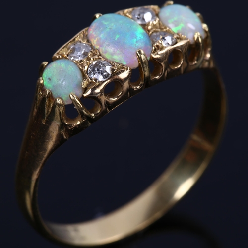 122 - An 18ct gold seven stone opal and diamond half hoop ring, set with oval cabochon opal and old and mo... 