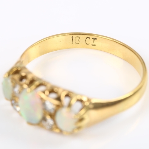 122 - An 18ct gold seven stone opal and diamond half hoop ring, set with oval cabochon opal and old and mo... 