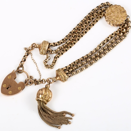 123 - An Antique 9ct gold triple link bracelet, with foliate engraved slider fob, tassel fob and heart pad... 