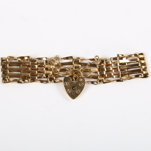 129 - A 9ct gold gatelink chain bracelet, with heart padlock clasp, bracelet length 17cm, 9g