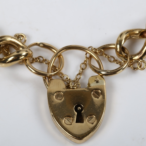 130 - A 9ct gold hollow curb link chain bracelet, with heart padlock clasp, bracelet length 19cm, 17.9g