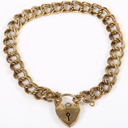 131 - A 9ct gold double curb link chain bracelet, with heart padlock clasp, bracelet length 18cm, 13.2g