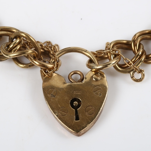 131 - A 9ct gold double curb link chain bracelet, with heart padlock clasp, bracelet length 18cm, 13.2g