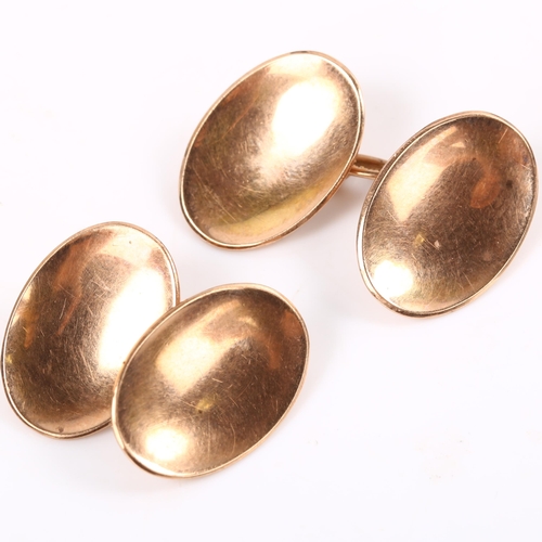 133 - A pair of Art Deco 9ct rose gold cufflinks, oval concave design, maker's marks B & Co, hallmarks Lon... 