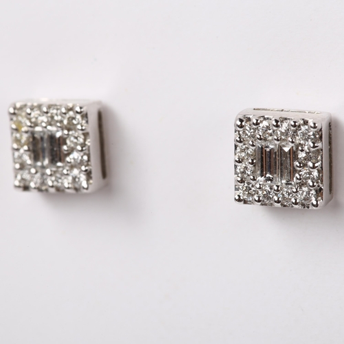 139 - A pair of 18ct white gold diamond cluster earrings, set with baguette and modern round brilliant-cut... 